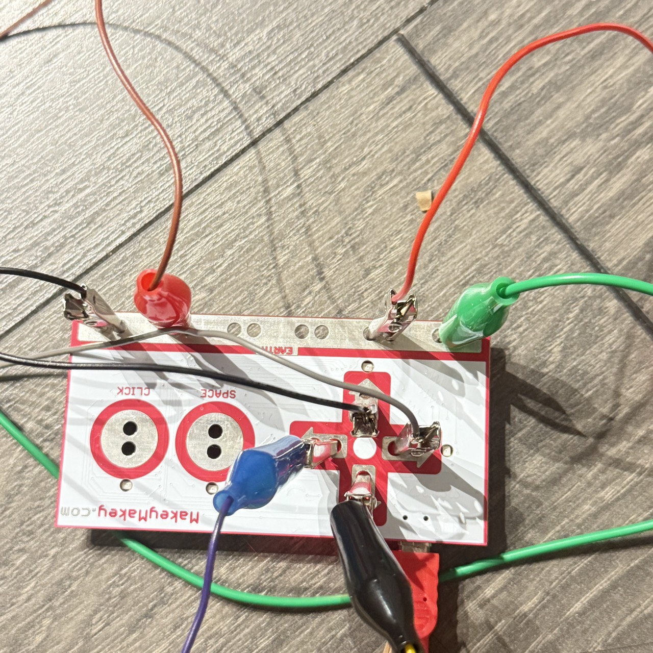 The initial software test confirms that Makey Makey successfully detects key inputs and triggers actions on-screen. The unknown is whether the system will remain stable once multiple sensors and larger conductive surfaces are added.