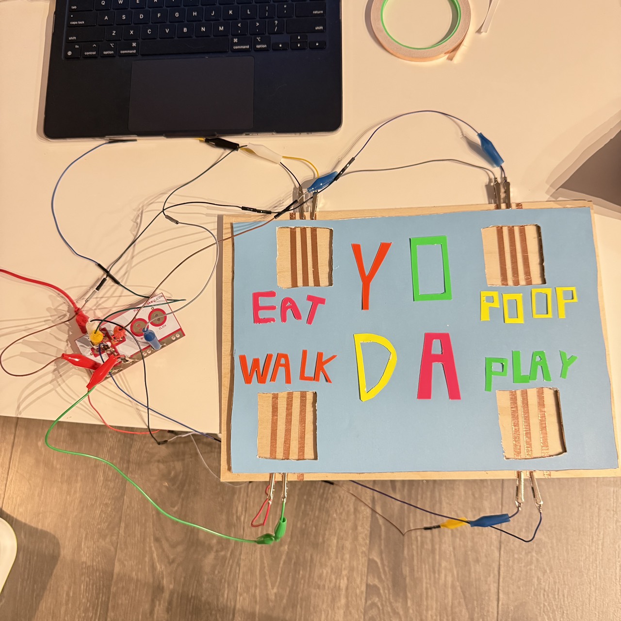 This wiring test shows that Makey Makey can support multiple simultaneous paw sensors without losing signal. An unknown remains regarding cable management and maintaining stable connections in the final casing.